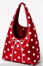 White polka dot hobo bag