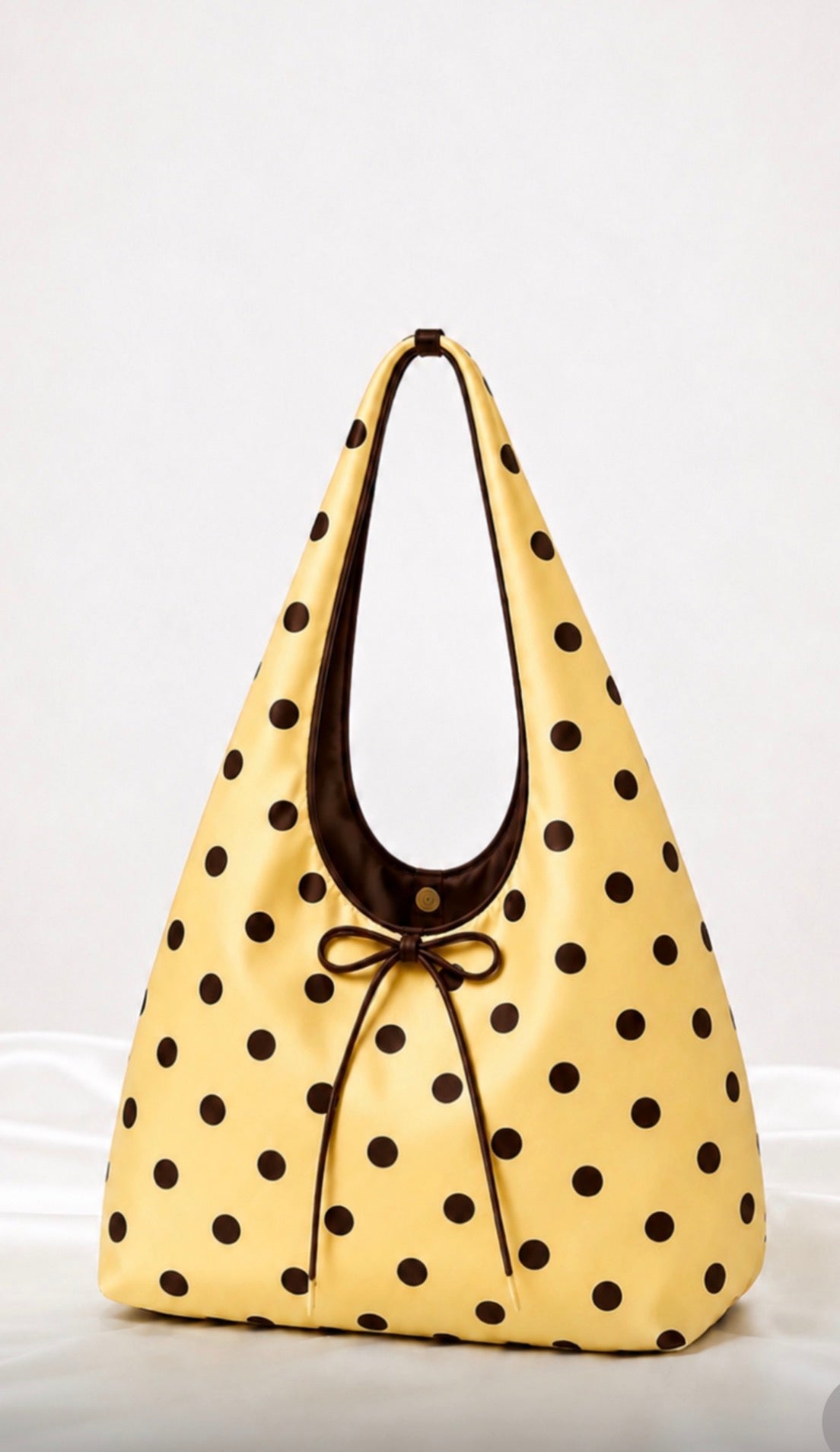 Brown polka dot hobo bag